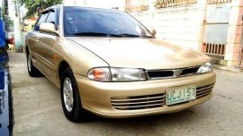 Mitsubishi Lancer 1995 gold for sale