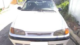 Kia Avella 2009 WHITE FOR SALE