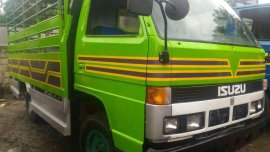 Isuzu Elf Truck 12ft 4BC2 MT Green For Sale 