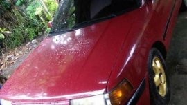 1994 Mazda 323 red gasoline manual for sale