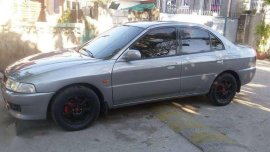 For sale silver Mitsubishi Lancer 2000 Model