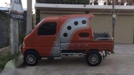 Vehicle Suzuki Multi-cab orange for sale
