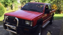 Mitsubishi Strada l200 4x4 turbo manual local for sale