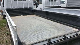 Cebu Isuzu Elf 4hf1 Engine 10ft Dropside Flat Low for sale