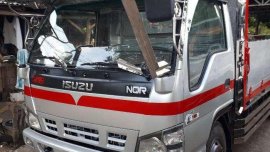 Isuzu Elf 4HE1 TURBO Silver Truck For Sale 
