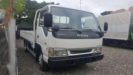 Isuzu Giga NPR Dropside 14ft White For Sale 