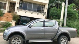 Good as new Mitsubishi Strada 2015 for sale
