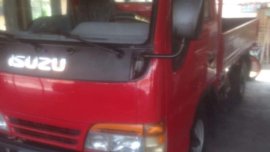Isuzu Elf Dropside 12ft MT Red Truck For Sale 