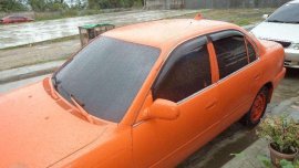 Toyota Corolla 1993 AT Orange Sedan For Sale 