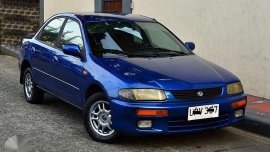 Mazda FAMILIA 1997 Gen 2 MT Blue Sedan For Sale 