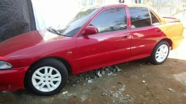 Mitsubishi Lancer GLI 1.5 EFI MT Red Sedan For Sale 