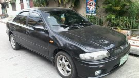 Good as new Mazda 323 1999 for sale