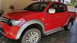 Mitsubishi Strada truck 4x4 automatic diesel 2010 for sale