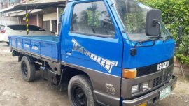Isuzu Elf dropside blue for sale