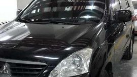 2009 Mitsubishi Fuzion black for sale