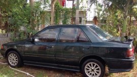 Mazda 323 1996 Manual Green Sedan For Sale 
