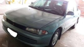 For sale car: Mitsubishi Lancer Sedan 4-door car 1996