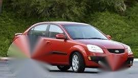 Kia Rio Automatic Signal Red 2010 for sale 