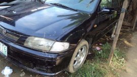 Fresh Mazda 323 Loaded Aircon Black For Sale 