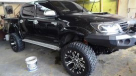 Almost brand new Toyota Hilux Gasoline 2014 for sale