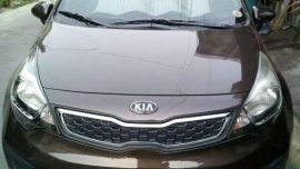 Kia Rio sedan 2014 model wendy brown color,