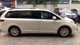 2015 Toyota Sienna XLE White on beige leather. 