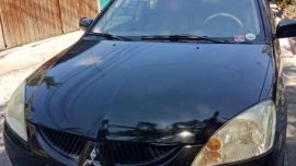 MITSUBISHI Lancer gls 2006 Registerd Orig or cr complte papers