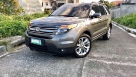 2013 Ford Explorer (Top of d line) not Landcruiser Rover