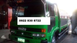 2006 Isuzu Forward dropside 21ft long big tires compressor type