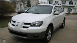 Looking for 2004-2005 Mitsubishi Outlander AT