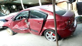 Mazda 3 model 2007 damage
