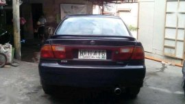 Fresh Mazda 323 1998 model AT Blue For Sale 