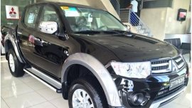 Almost brand new Mitsubishi Strada Diesel 2014