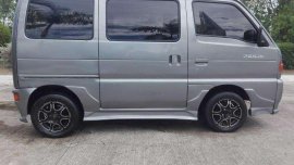 2010 Suzuki Multivan scrum cat eye