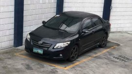 Toyota Corolla Altis 1.6V 2010 AT Black For Sale 