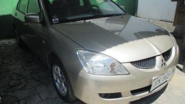 Well-maintained Mitsubishi Lancer 2006 GLX MT for sale