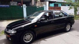 Mazda 323 Familia 1996  Black For Sale 
