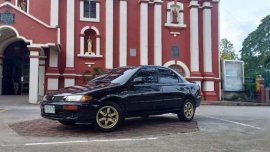 Mazda familia 1997 for sale