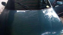 mazda 323 1997 Green sedan for sale 