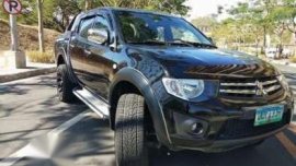 2012 Mitsubishi Strada GLXV ACCUIRED 2013