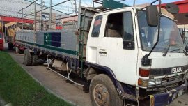 Isuzu Forward dropside 8 studs 26ft long