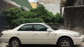 97 Toyota Camry Pearl White automatic FOR SALE