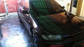 Mazda 323 familia 2000model FOR SALE