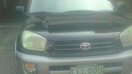 Toyota RAV4 year model 2001 color black 