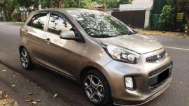 2015 Kia Picanto 12 EX Automatic AT cmpare to 2014