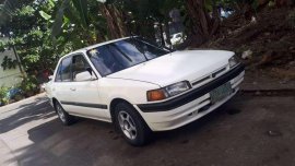 Mazda 323 Familia 97 model MT