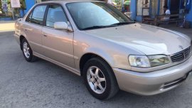Selling my Toyota COROLLA gli baby altis 2000 model