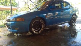 Mitsubishi Lancer pizza pie 1998 model power steering