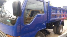 1997 Isuzu Elf Mini Dump 4x2 High Deck, High Side Blue