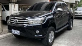 Selling Toyota hilux 4x2 G Automatic diesel Black 2016